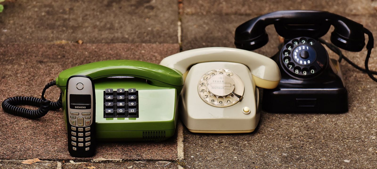 Selection of old phones including a mobile phone